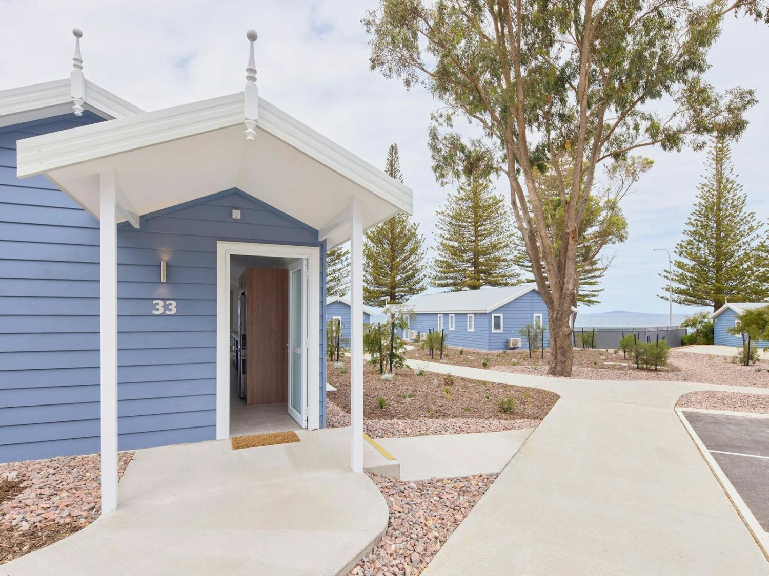 Modern beach villa with path to entry