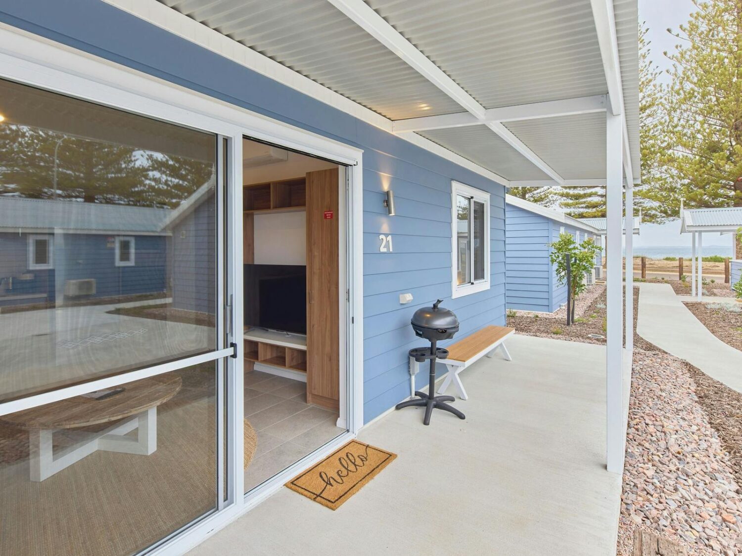 Entrance to the one bedroom studio and patio with a bbq