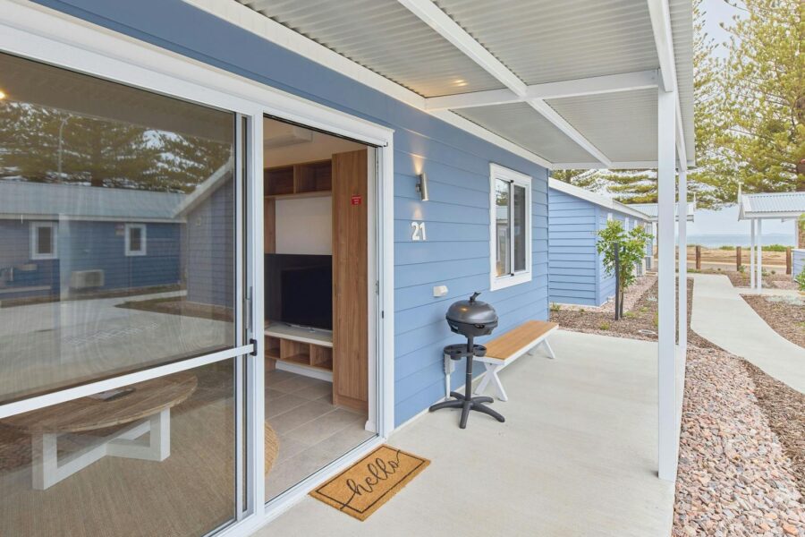 Entrance to the one bedroom studio and patio with a bbq