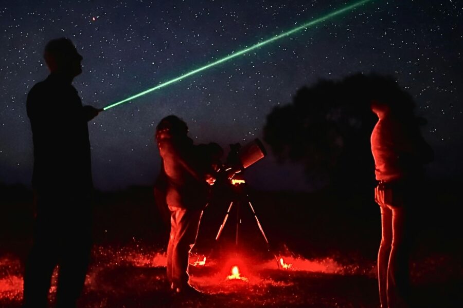 Ningaloo Stars guide using a green laser to point out features in the night sky